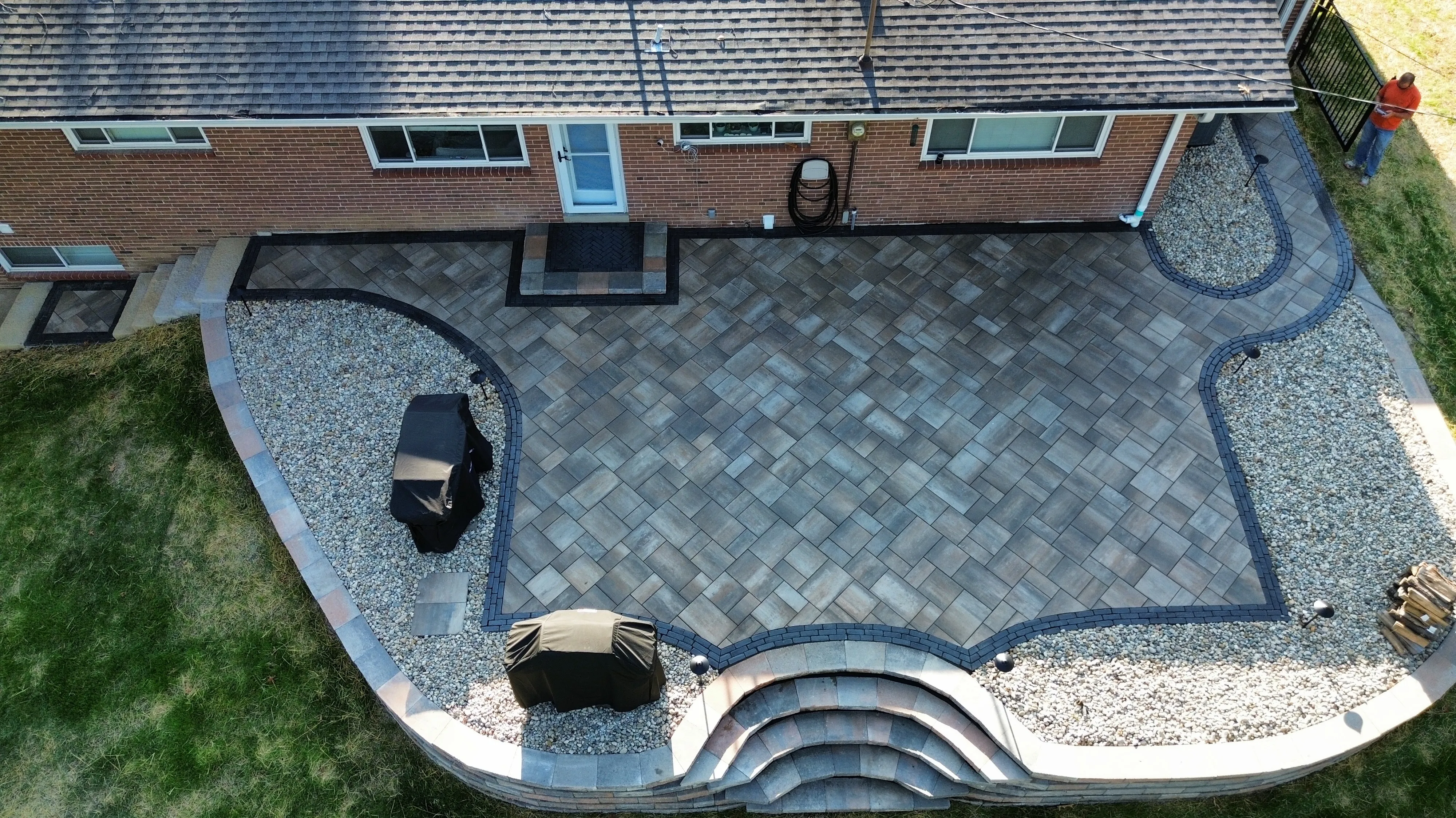 Aerial view of large paver patio with accent band in St. Louis