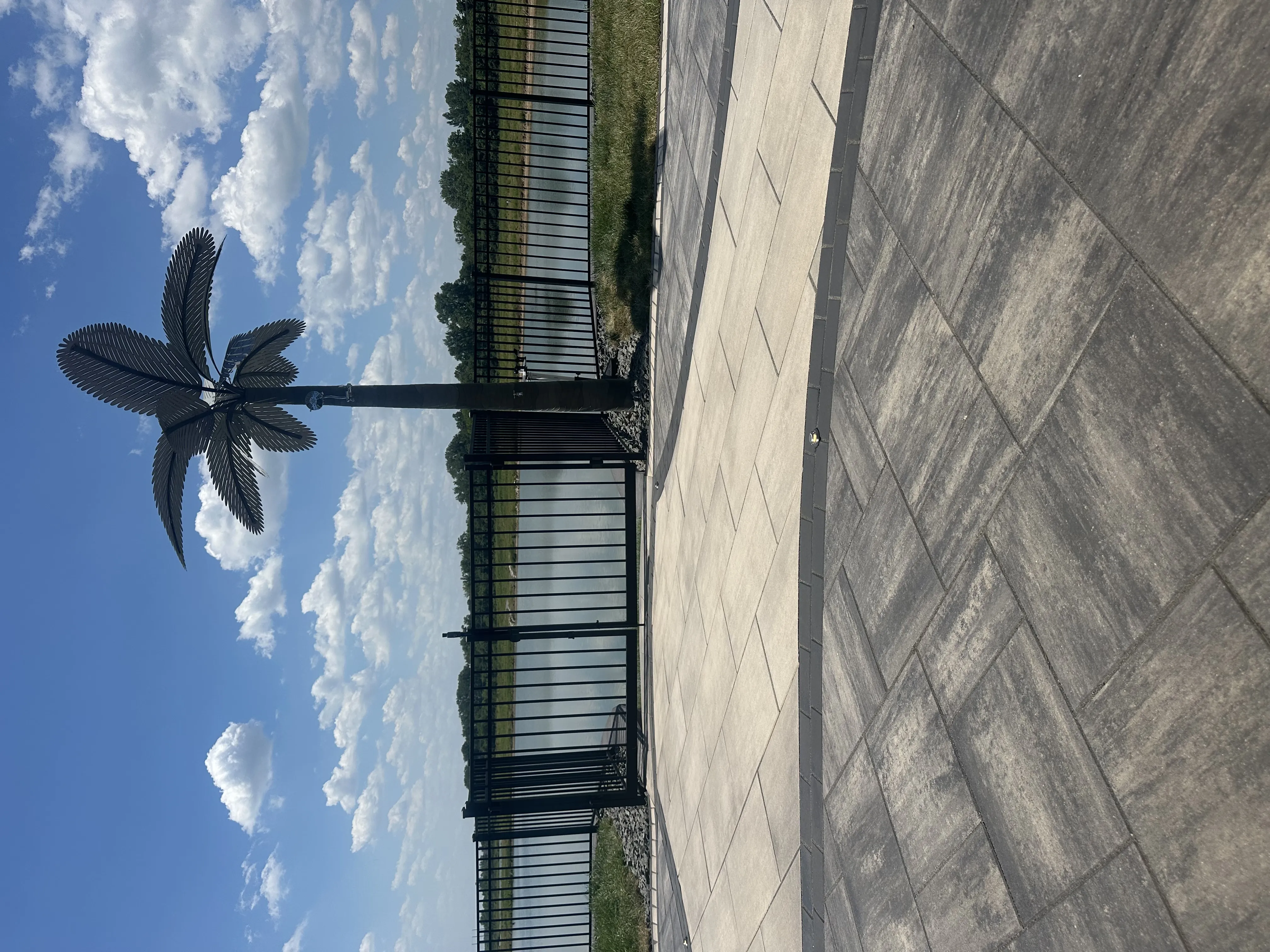 Lakefront paver patio with gazebo built by Green Operations
