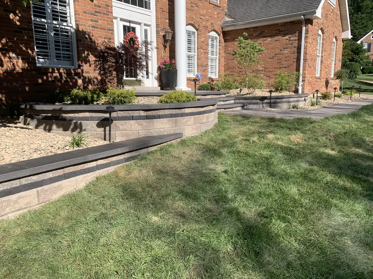 Full view of block retaining wall installed along front yard in St. Louis