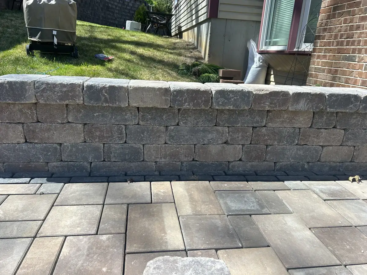 Decorative block seating wall surrounding patio area
